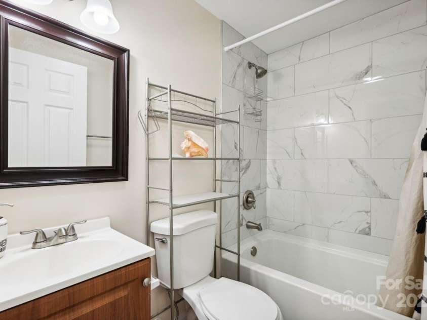 712 Grace Avenue, Kannapolis, NC 28083.  MLS# CAR4252266, YatesRealty ID 18233. Full bathroom with modern charm.