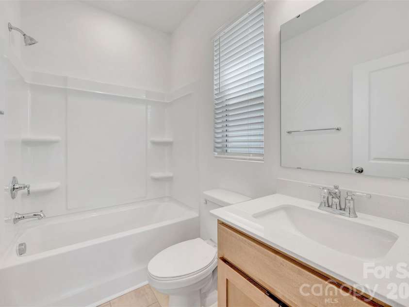 1719 Boulder Ridge Drive, Gastonia, NC 28052.  MLS# CAR4346176, YatesRealty ID 18235. First floor bathroom