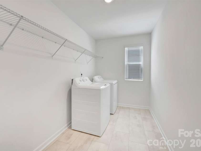 1719 Boulder Ridge Drive, Gastonia, NC 28052.  MLS# CAR4346176, YatesRealty ID 18235. Laundry room