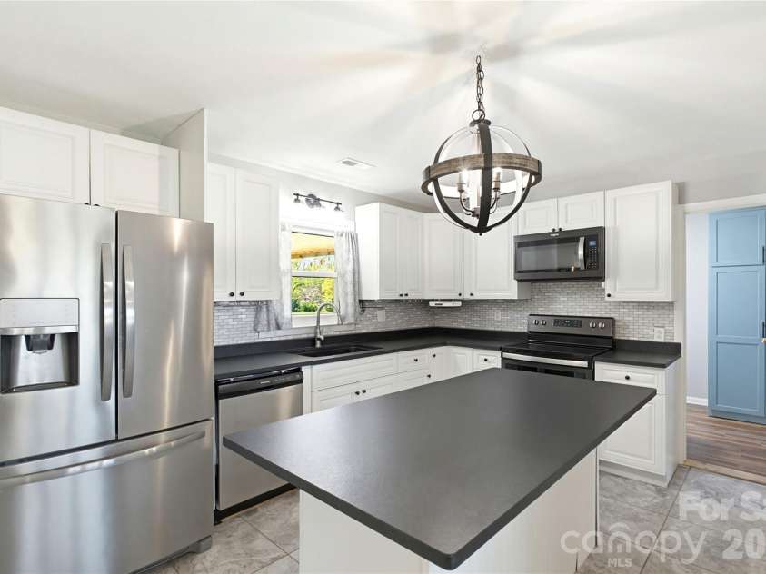 279 Garden Lane, Canton, NC 28716.  MLS# CAR4365591, YatesRealty ID 18237. 