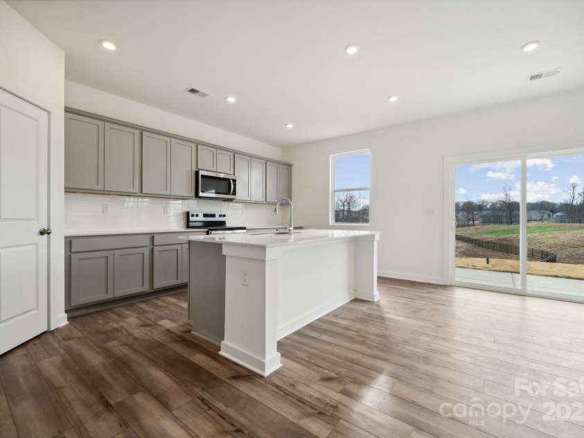 2592 Blue Sky Meadows Drive, Monroe, NC 28110.  MLS# CAR4259735, YatesRealty ID 18238. Representative photo only