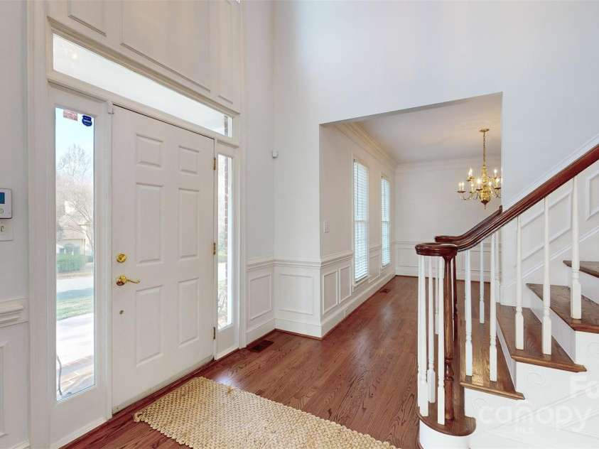 3714 Radbourne Boulevard, Charlotte, NC 28269.  MLS# CAR4195925, YatesRealty ID 1824. Foyer from living room