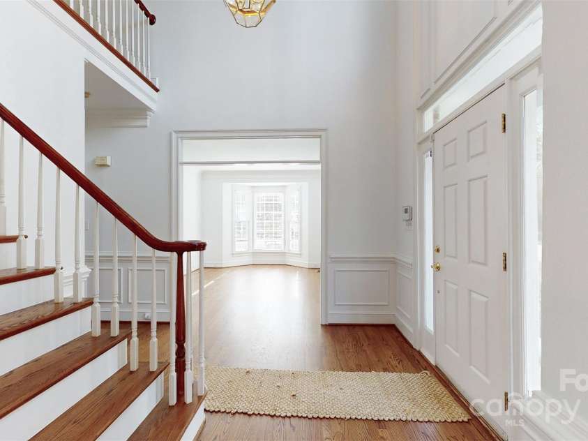 3714 Radbourne Boulevard, Charlotte, NC 28269.  MLS# CAR4195925, YatesRealty ID 1824. Living room from foyer