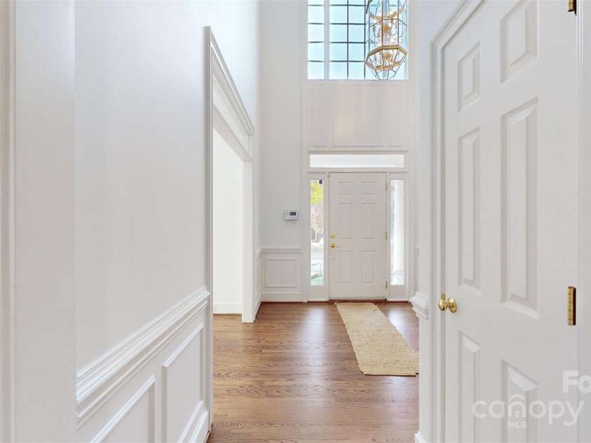 3714 Radbourne Boulevard, Charlotte, NC 28269.  MLS# CAR4195925, YatesRealty ID 1824. View of front door from entryway