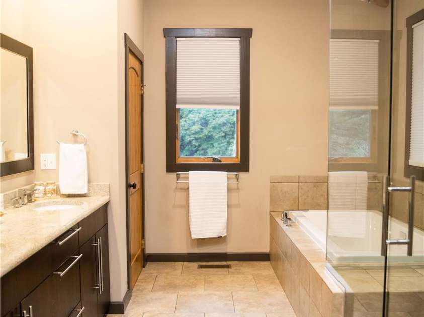 425 Flat Top Mountain Road, Fairview, NC 28730.  MLS# CAR4343659, YatesRealty ID 1824. Main Bathroom 