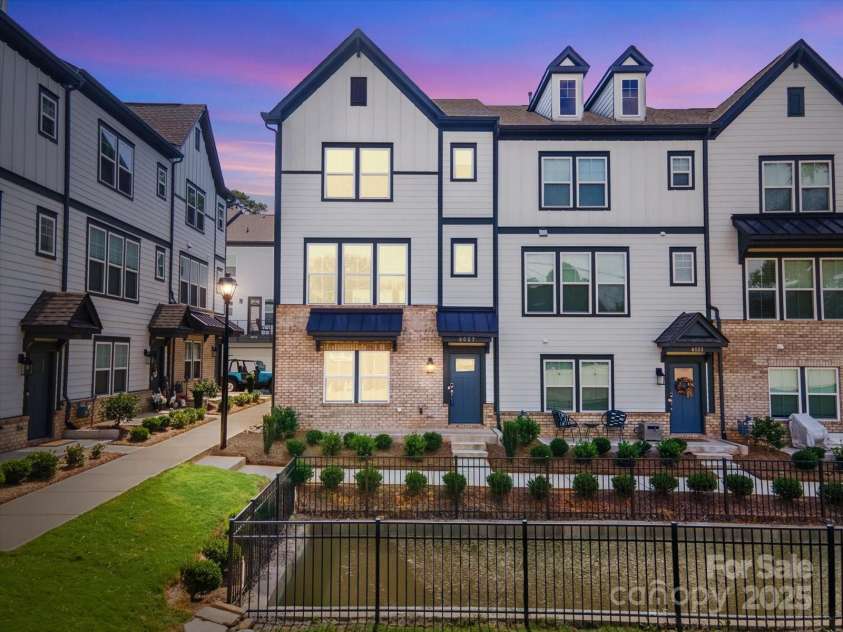 6027 Towering Oaks Drive, Charlotte, NC 28205.  MLS# CAR4298053, YatesRealty ID 18240. Enhanced to show property once pond is filled