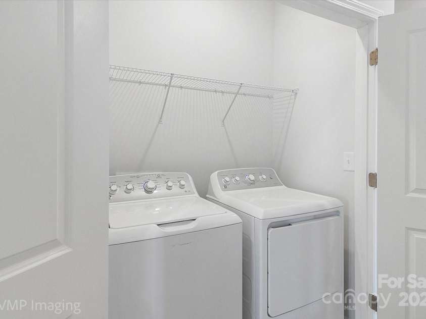 6027 Towering Oaks Drive, Charlotte, NC 28205.  MLS# CAR4298053, YatesRealty ID 18240. Laundy area