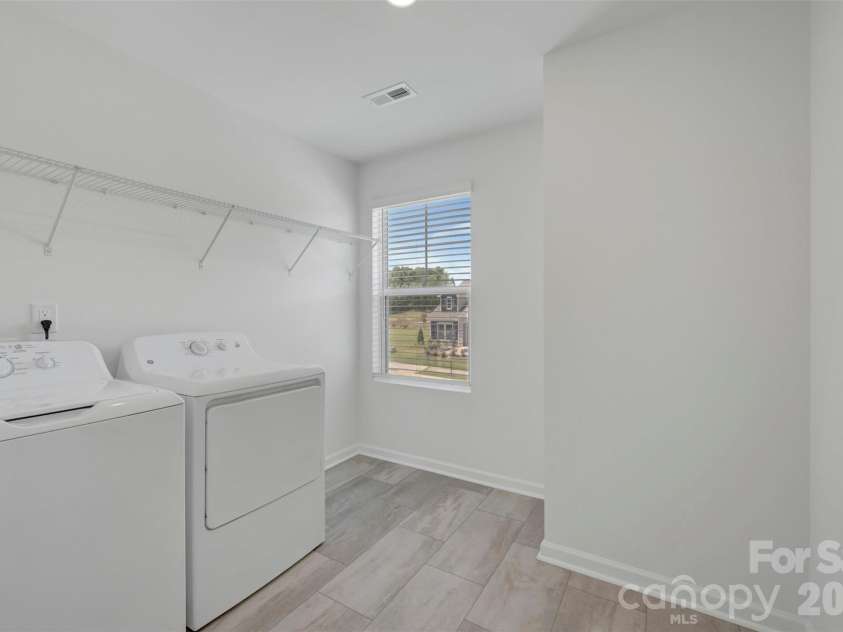 1735 Boulder Ridge Drive, Gastonia, NC 28052.  MLS# CAR4343306, YatesRealty ID 18249. Laundry room