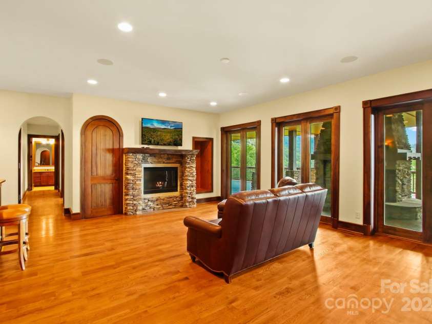 691 Dogwood Lane, Blowing Rock, NC 28605.  MLS# CAR4131831, YatesRealty ID 1825. Lower level living room