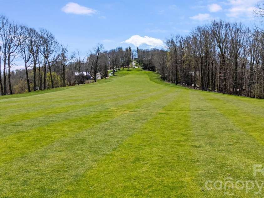 234 Upper Lookout Drive, Mars Hill, NC 28754.  MLS# CAR4363467, YatesRealty ID 18252. Home Fronts #3 Fairway