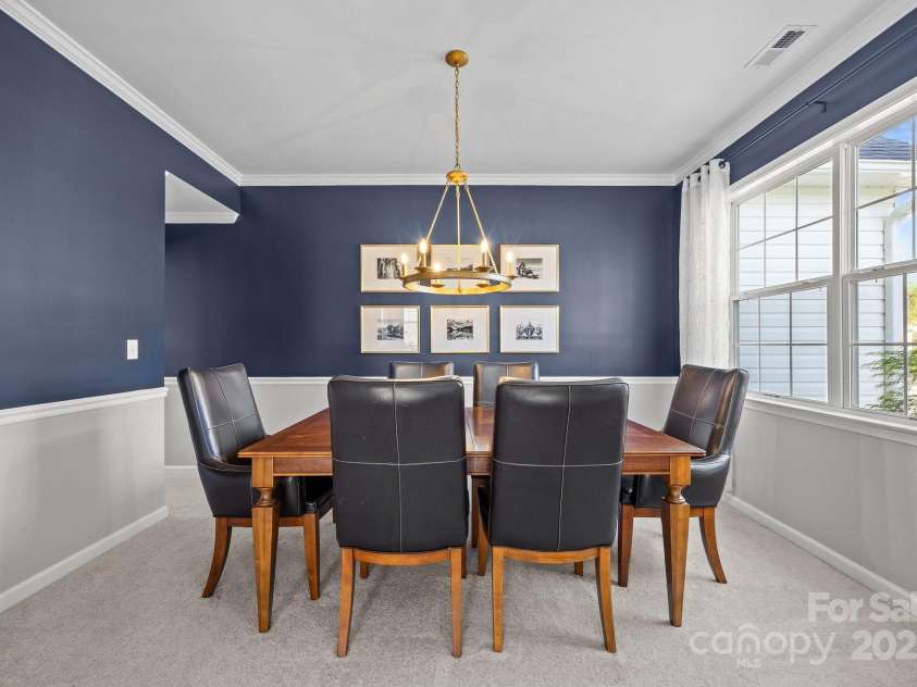 347 Wildbriar Road, Fletcher, NC 28732.  MLS# CAR4250812, YatesRealty ID 18254. A sophisticated, bright dining room perfect for entertaining