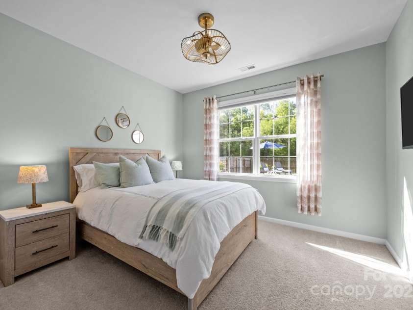 347 Wildbriar Road, Fletcher, NC 28732.  MLS# CAR4250812, YatesRealty ID 18254. Guest Suite features scenic views of pool and backyard