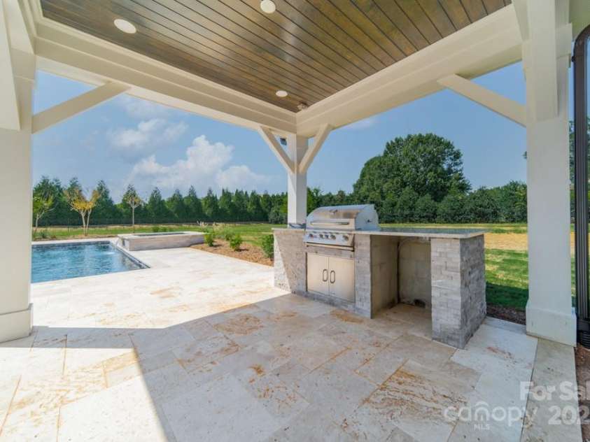 306 Sugar Maple Lane, Weddington, NC 28104.  MLS# CAR4257600, YatesRealty ID 18255. Representation photo only. Not all options/pool as seen in pictures are included in this build