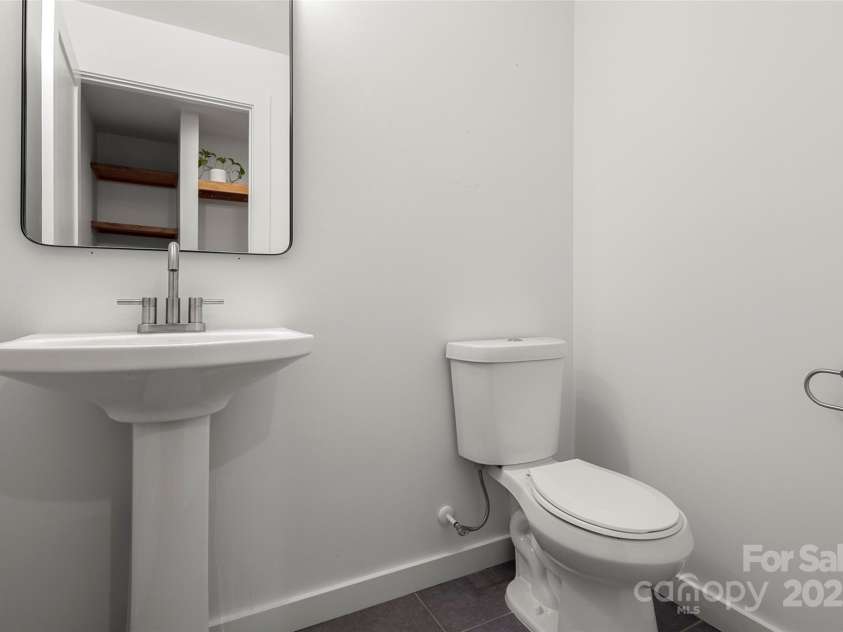 79 Euclid Boulevard, Asheville, NC 28806.  MLS# CAR4253101, YatesRealty ID 18258. Main level half bathroom