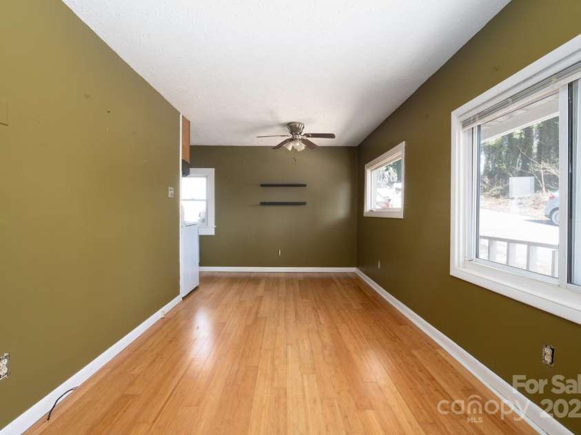 17 & 19 Hubbard Avenue, Asheville, NC 28806.  MLS# CAR4259488, YatesRealty ID 1826. Living Room into Dining Area