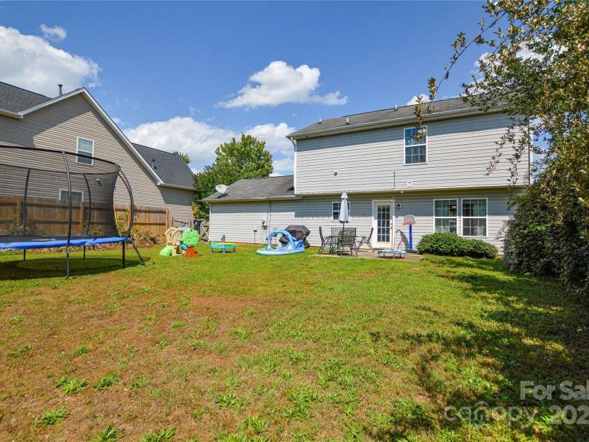 4075 Clover Road, Concord, NC 28027.  MLS# CAR4260608, YatesRealty ID 18266. Backyard