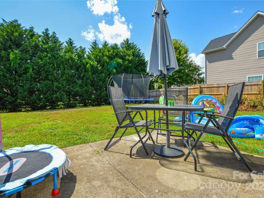 4075 Clover Road, Concord, NC 28027.  MLS# CAR4260608, YatesRealty ID 18266. Backyard