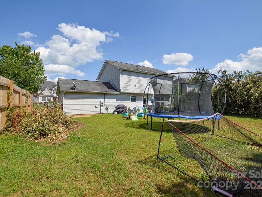 4075 Clover Road, Concord, NC 28027.  MLS# CAR4260608, YatesRealty ID 18266. Backyard