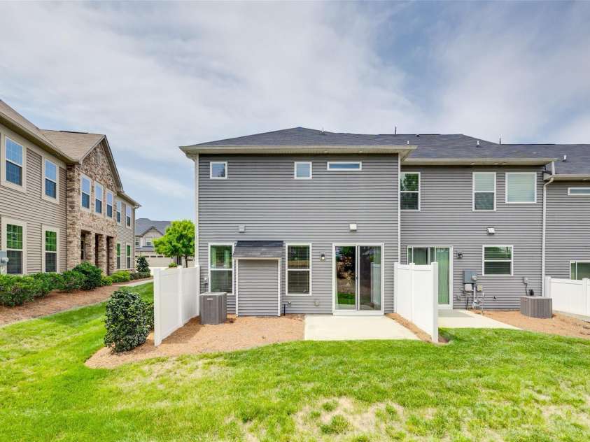 5836 Clan Maclaine Drive, Charlotte, NC 28278.  MLS# CAR4259944, YatesRealty ID 18274. End Unit Bonus Backyard for added space and privacy