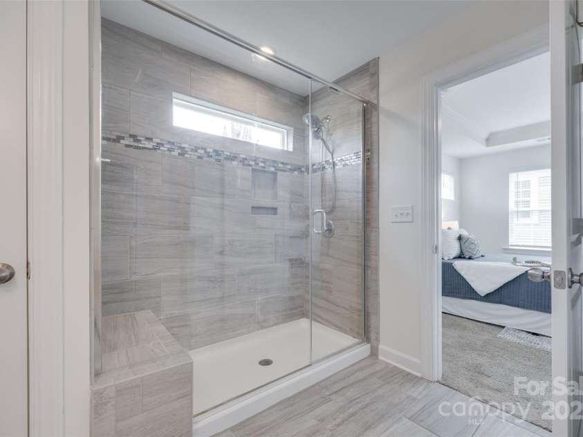 5836 Clan Maclaine Drive, Charlotte, NC 28278.  MLS# CAR4259944, YatesRealty ID 18274. Floor to Ceiling Luxury Shower Oasis