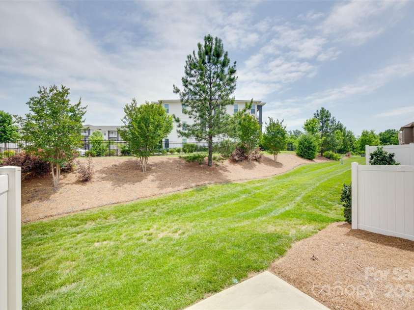 5836 Clan Maclaine Drive, Charlotte, NC 28278.  MLS# CAR4259944, YatesRealty ID 18274. Private Lot - Enjoy the Concrete Pad, Pine Straw and tons of Grassy area!