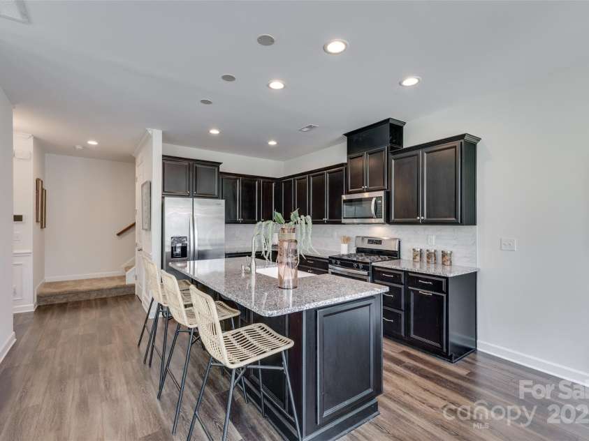 5836 Clan Maclaine Drive, Charlotte, NC 28278.  MLS# CAR4259944, YatesRealty ID 18274. Spacious Kitchen Island with Seating