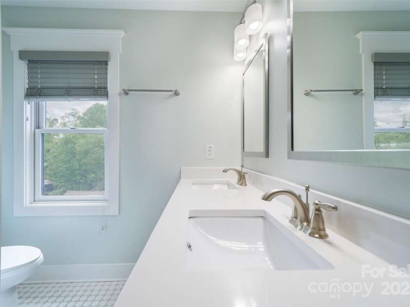 21 Bryant Street, Asheville, NC 28806.  MLS# CAR4255456, YatesRealty ID 18278. Primary bath