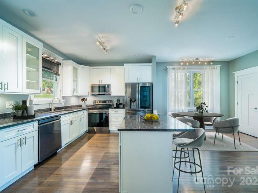 21 Bryant Street, Asheville, NC 28806.  MLS# CAR4255456, YatesRealty ID 18278. Virtually Staged