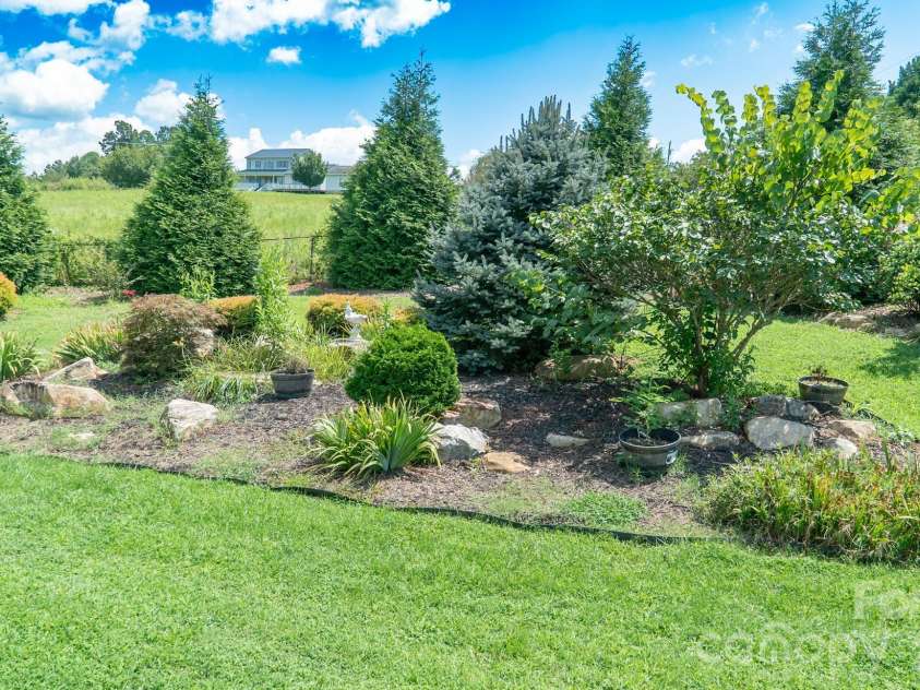 1633 Jamestown Road, Morganton, NC 28655.  MLS# CAR4282271, YatesRealty ID 18279. Back yard