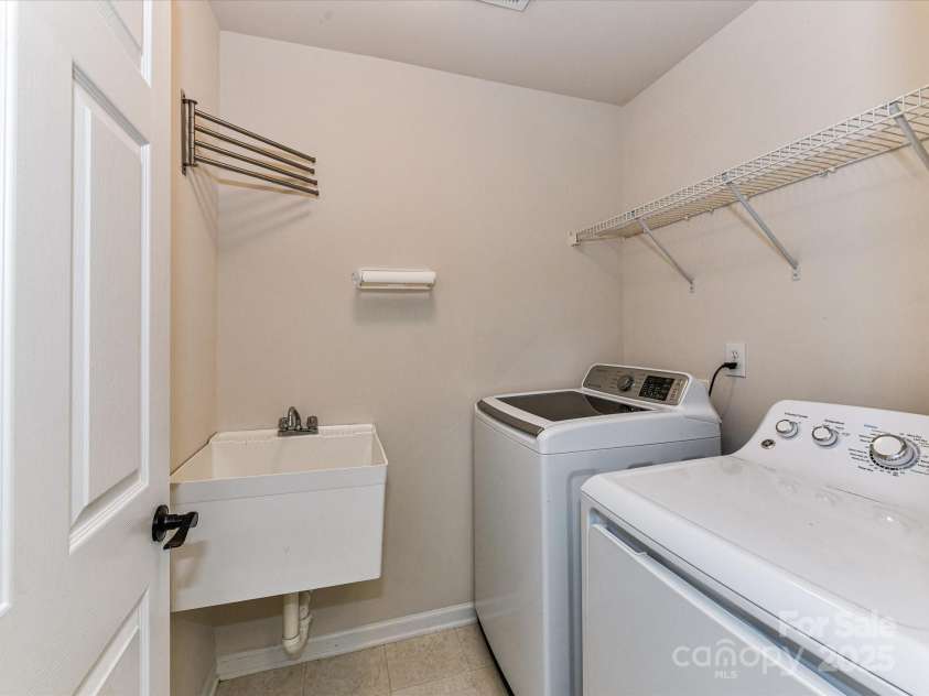 8608 Talbert Paige Court, Charlotte, NC 28277.  MLS# CAR4265517, YatesRealty ID 18279. 2nd Floor Laundry