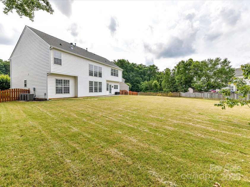 8608 Talbert Paige Court, Charlotte, NC 28277.  MLS# CAR4265517, YatesRealty ID 18279. Huge flat back yard
