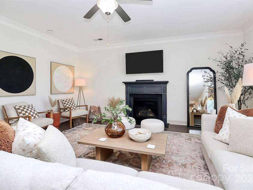 8916 Inverness Bay Road, Charlotte, NC 28278.  MLS# CAR4258017, YatesRealty ID 18286. A third view of the living room with crown molding to complete the picture