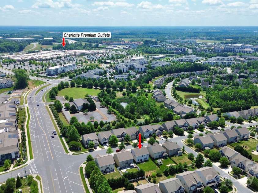 8916 Inverness Bay Road, Charlotte, NC 28278.  MLS# CAR4258017, YatesRealty ID 18286. Aerial view of home showing proximity to the Charlotte Premium Outlet where there are tons of restaurants and shopping
