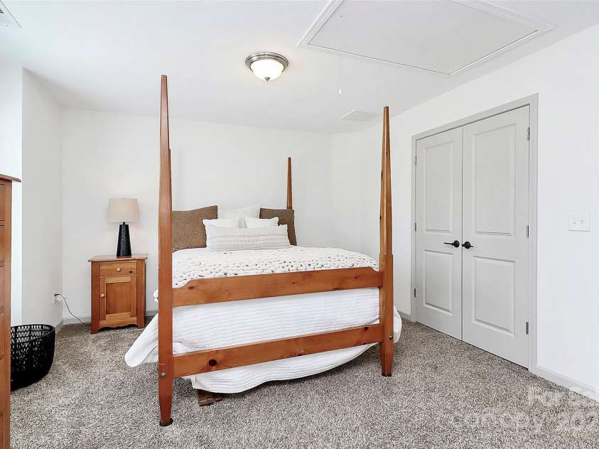 8916 Inverness Bay Road, Charlotte, NC 28278.  MLS# CAR4258017, YatesRealty ID 18286. Final view of this second bedroom with a double door closet and pull-down attic access