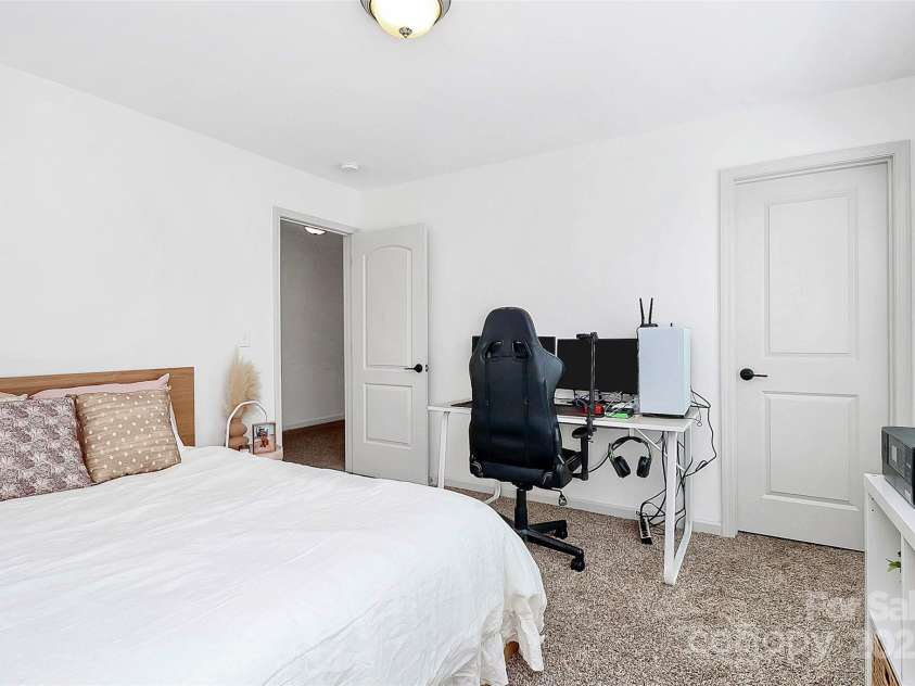 8916 Inverness Bay Road, Charlotte, NC 28278.  MLS# CAR4258017, YatesRealty ID 18286. First of three secondary bedrooms on the upper level with a spacious closet