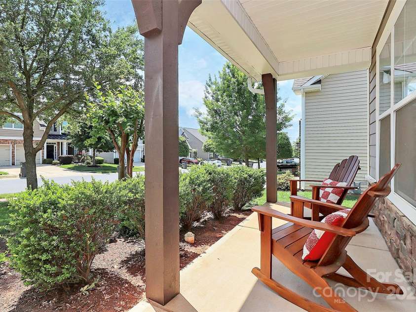 8916 Inverness Bay Road, Charlotte, NC 28278.  MLS# CAR4258017, YatesRealty ID 18286. Front porch for visiting neighbors on summer evenings
