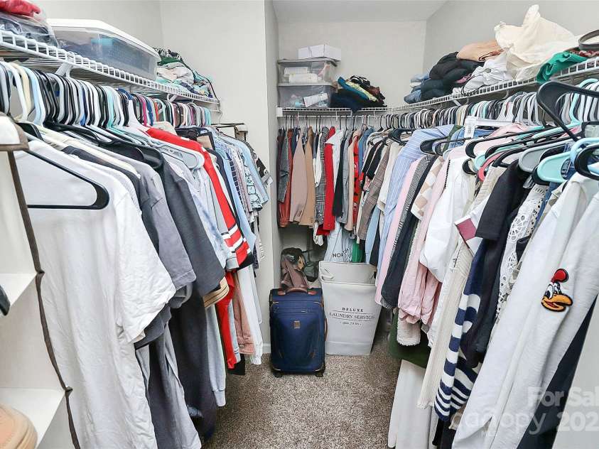 8916 Inverness Bay Road, Charlotte, NC 28278.  MLS# CAR4258017, YatesRealty ID 18286. Large primary closet for all your storage needs