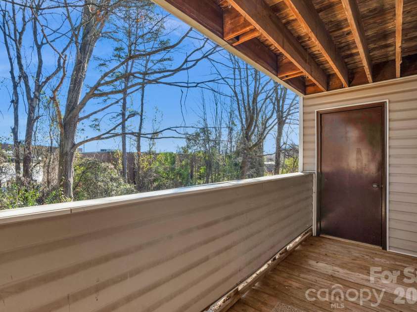 7530 Pebblestone Drive, Charlotte, NC 28212.  MLS# CAR4335858, YatesRealty ID 18292. Balcony Storage 1