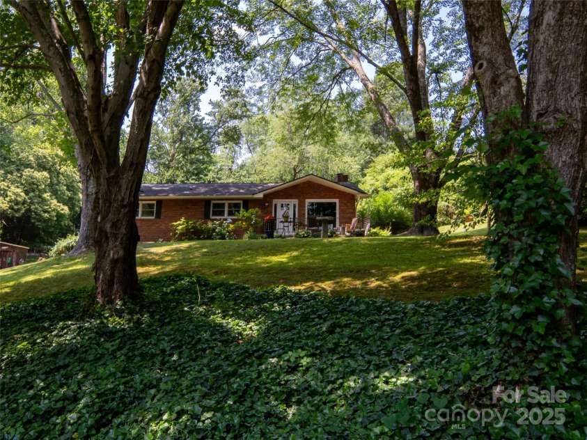 26 Melton Road, Candler, NC 28715.  MLS# CAR4268162, YatesRealty ID 18294. 