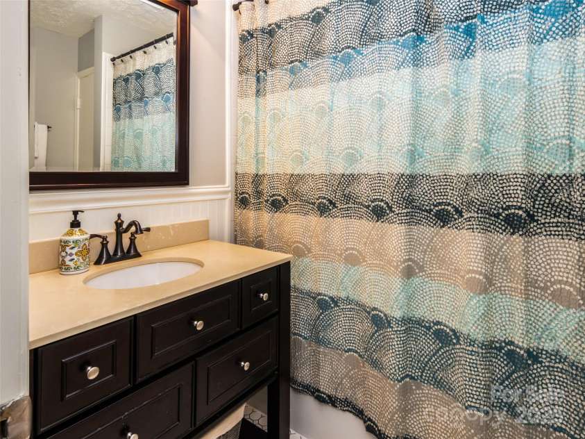 26 Melton Road, Candler, NC 28715.  MLS# CAR4268162, YatesRealty ID 18294. 