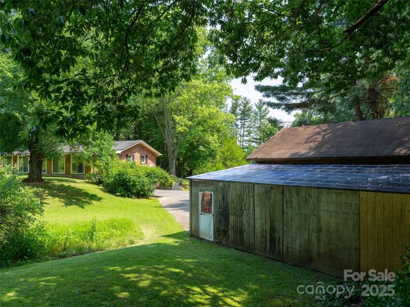 26 Melton Road, Candler, NC 28715.  MLS# CAR4268162, YatesRealty ID 18294. 