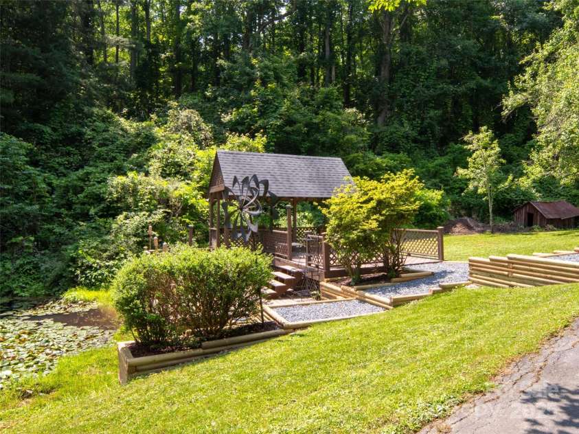 26 Melton Road, Candler, NC 28715.  MLS# CAR4268162, YatesRealty ID 18294. 