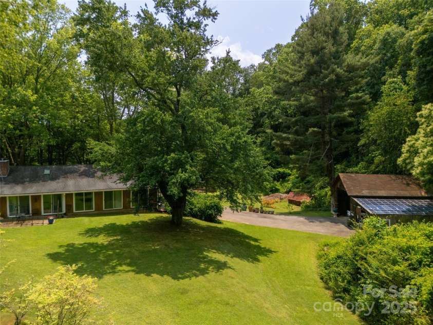 26 Melton Road, Candler, NC 28715.  MLS# CAR4268162, YatesRealty ID 18294. 