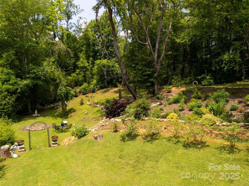 26 Melton Road, Candler, NC 28715.  MLS# CAR4268162, YatesRealty ID 18294. 