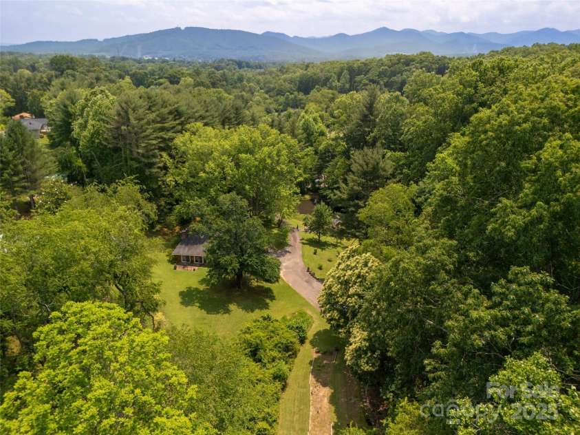 26 Melton Road, Candler, NC 28715.  MLS# CAR4268162, YatesRealty ID 18294. 