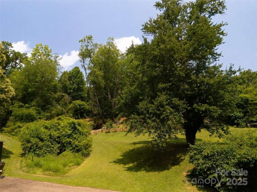 26 Melton Road, Candler, NC 28715.  MLS# CAR4268162, YatesRealty ID 18294. 