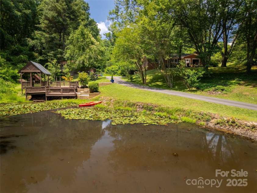 26 Melton Road, Candler, NC 28715.  MLS# CAR4268162, YatesRealty ID 18294. 