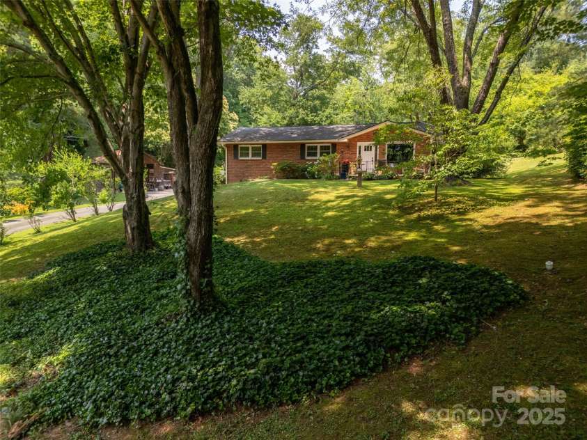 26 Melton Road, Candler, NC 28715.  MLS# CAR4268162, YatesRealty ID 18294. 