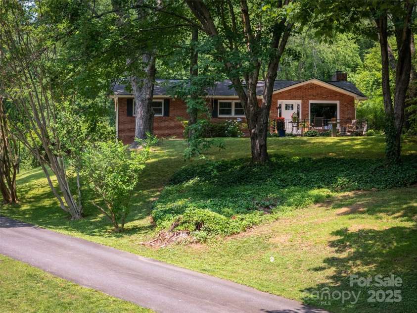26 Melton Road, Candler, NC 28715.  MLS# CAR4268162, YatesRealty ID 18294. 