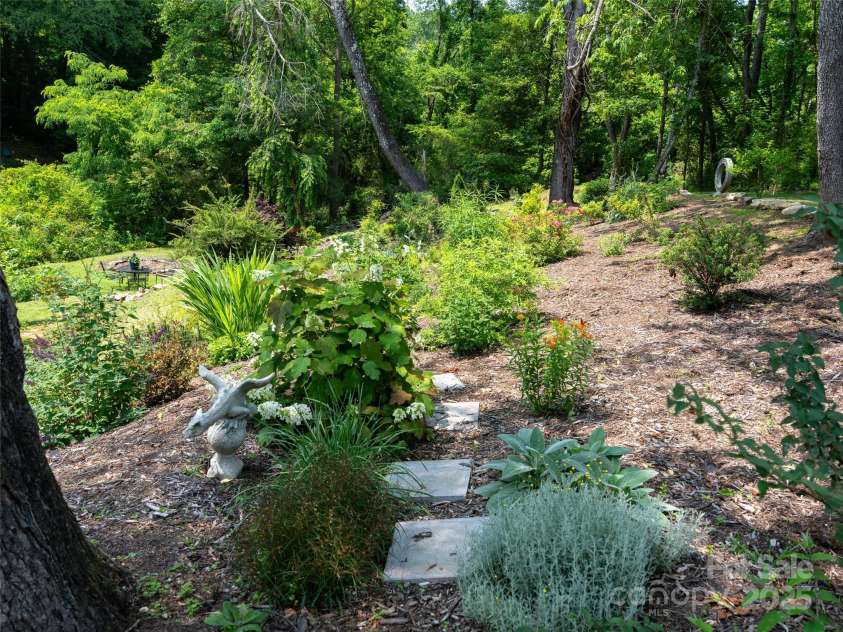 26 Melton Road, Candler, NC 28715.  MLS# CAR4268162, YatesRealty ID 18294. 